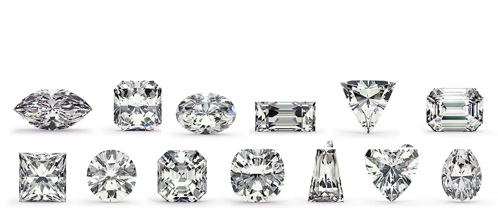 Assorted diamond shapes and cuts arranged in a row